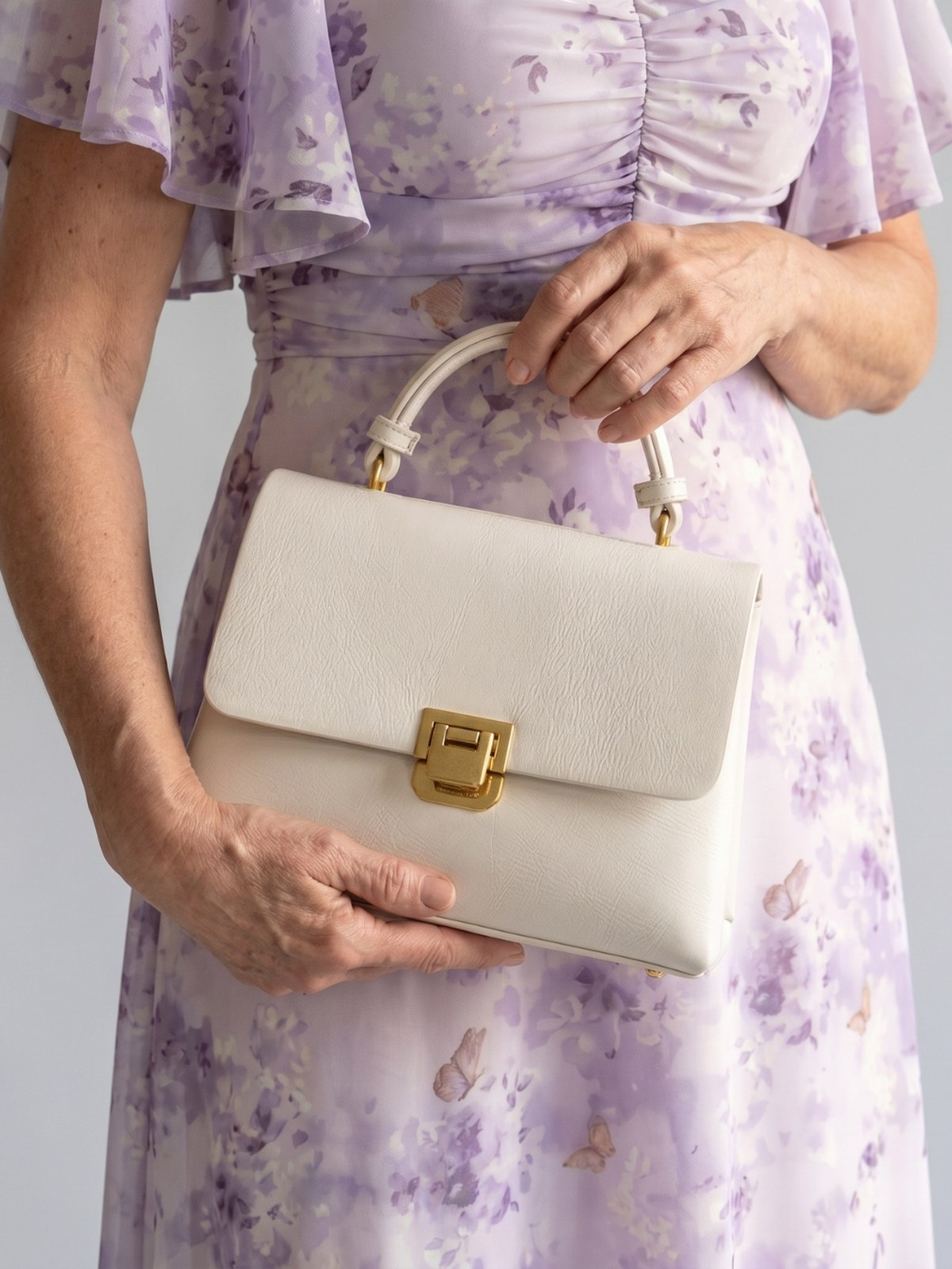 Adria | Structured top-handle bag with flap